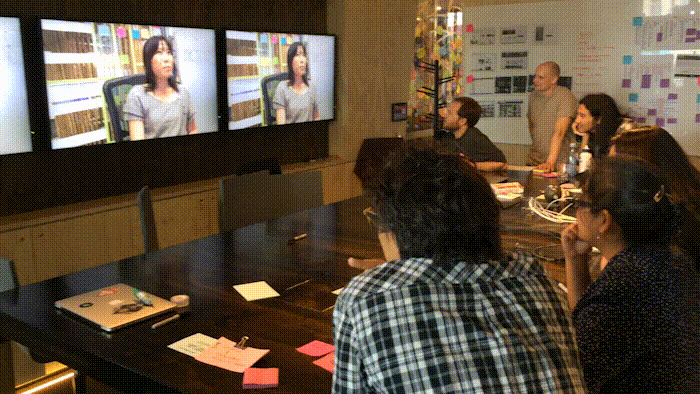 Team observing highlights from a user interview